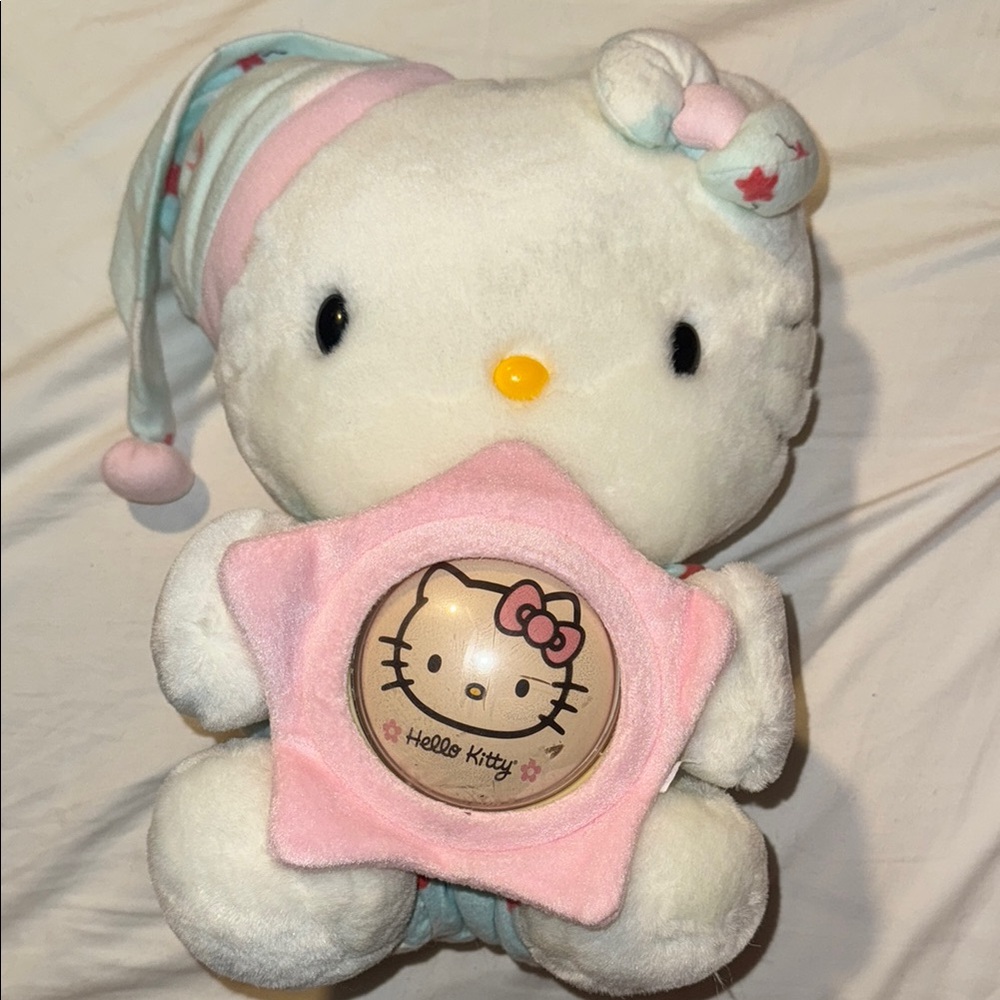Hello Kitty Plush with Pink Star night time star lights up with batteries works